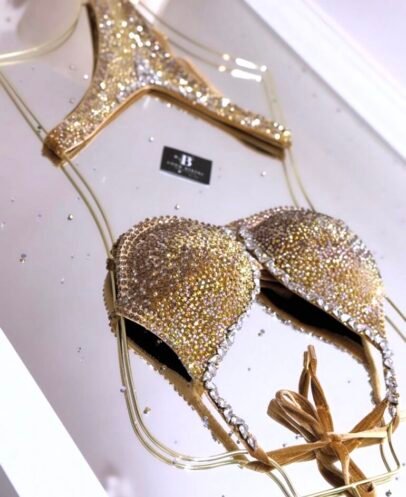 Gold crystal competition bikini with full sparkle detail for bodybuilding stage